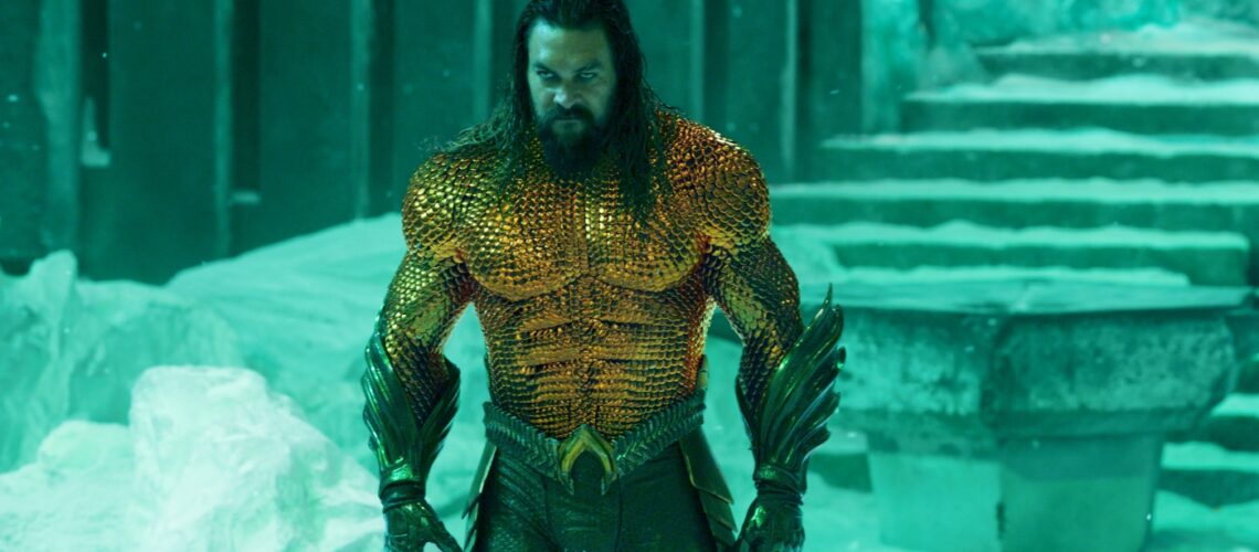Aquaman standing in front of snowy stairs