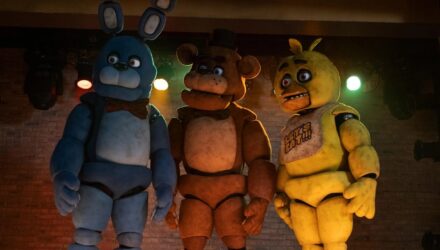 Freddy and his friends standing in a line