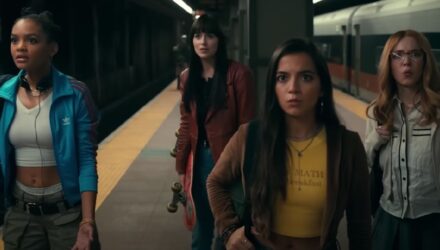 The cast of Madame Webb in a subway station looking confused