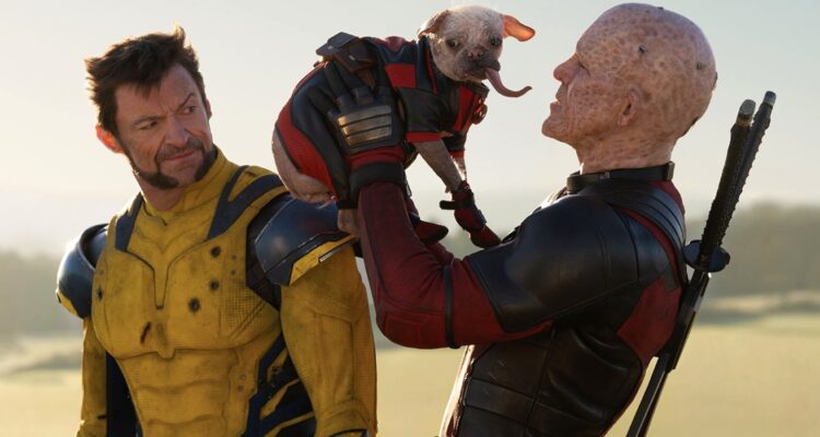 Deadpool holding his Deadpool dog while Wolverine looks on disgusted