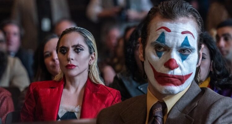 Joker and Harley Quinn sitting in court