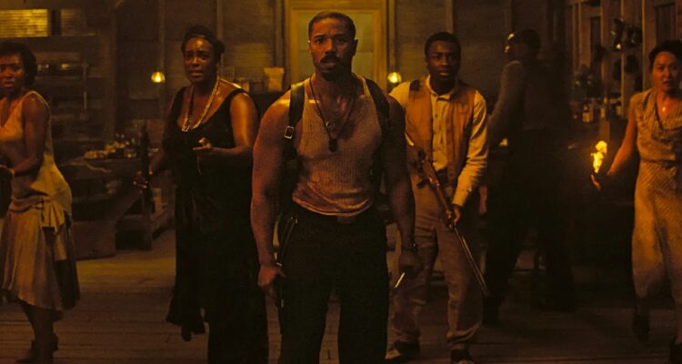 Michael B Jordan surrounded by characters from Sinners ready to fight