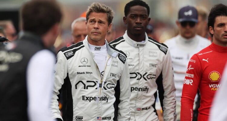 Brad Pitt and Damon Idris in racing gear F1: The Movie backtothepipcture.net movie still