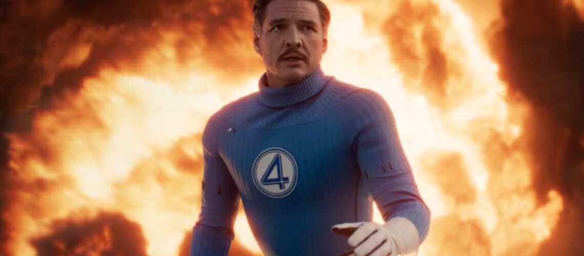 Reed Richards as Mr Fantastic standing in front of fire backtothepicture.net movie still