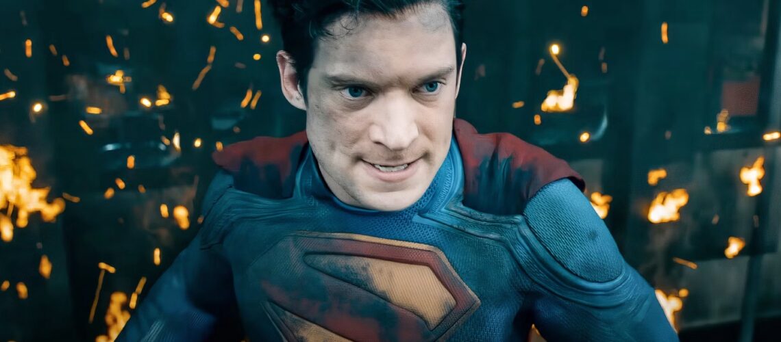 Superman brushing off flames backtothepicture.net movie still