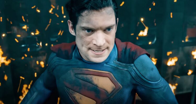 Superman brushing off flames backtothepicture.net movie still