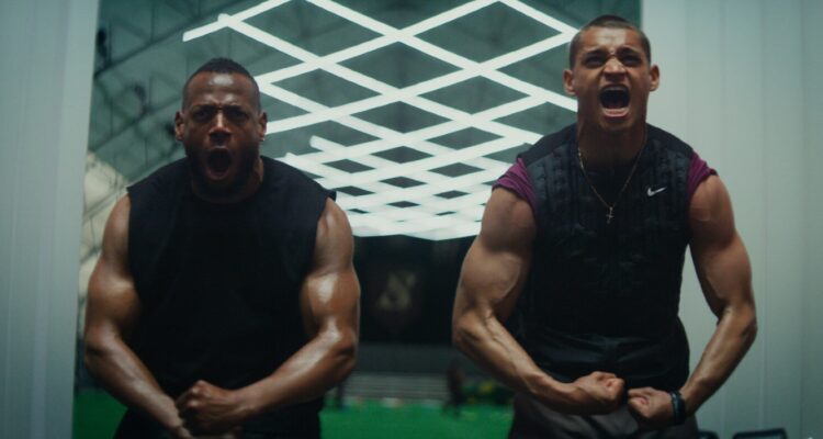 Main characters of Him flexing and yelling side by side backtothepicture.net movie still