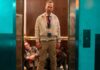 Bob Odinkirk standing bloody in an elevator in Nobody 2 backtothepicture.net still