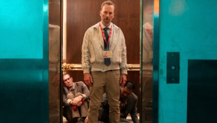 Bob Odinkirk standing bloody in an elevator in Nobody 2 backtothepicture.net still
