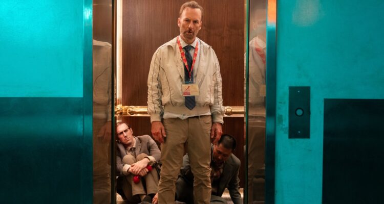 Bob Odinkirk standing bloody in an elevator in Nobody 2 backtothepicture.net still